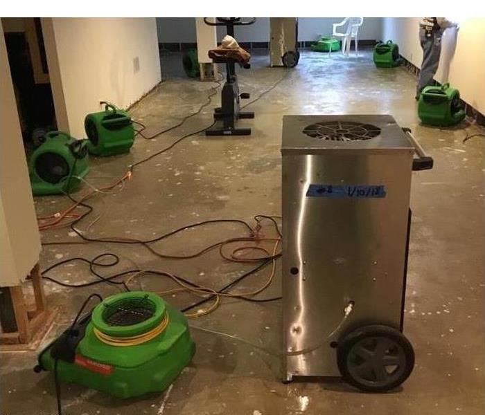 air movers, drying equipment placed on a basement